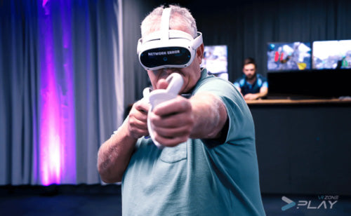 Older man playing VR games at VR Zone play