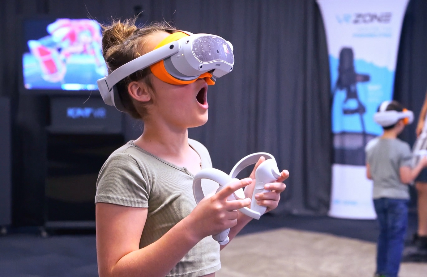 Girl amazed playing VR games at VR Arcade VR Zone Play in Adelaide Australia